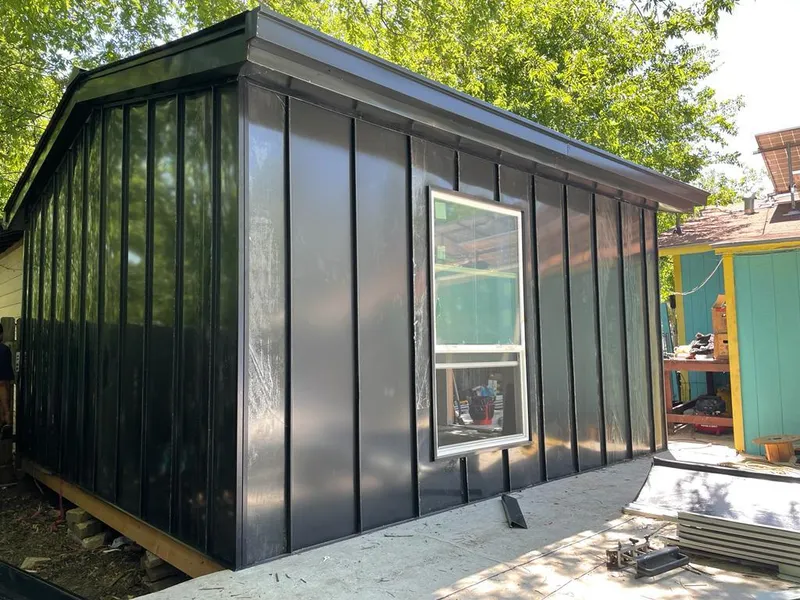 Black standing seam metal wall panels for Metal Roof Installation in Jensen Beach