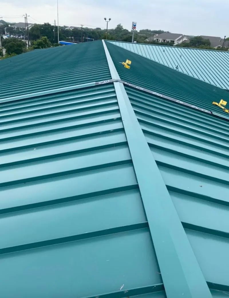 Green commercial metal roof ridge and valley for Metal Roof Repair in Jensen Beach